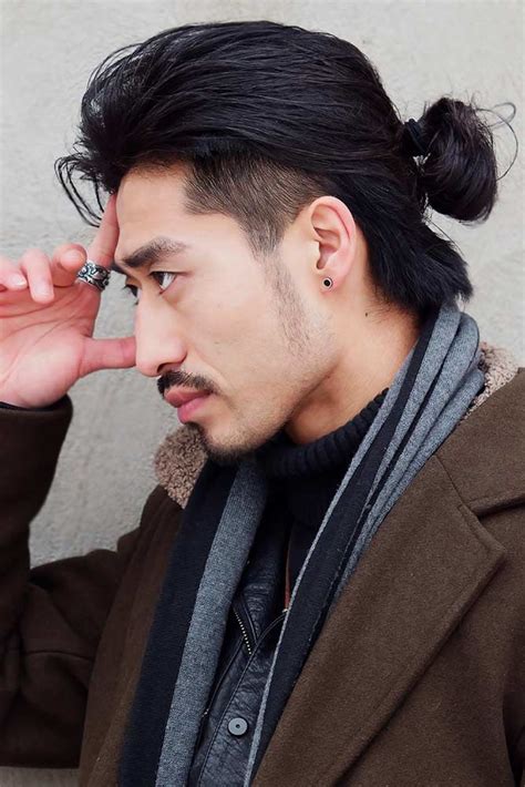 In this hairstyle, the sides are cropped very short whereas the hair on the top of the head is left long. . Long hair men asian
